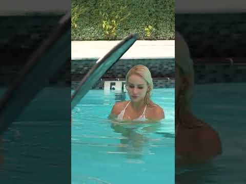 gorgeous girl in swimwear at Miami swim week 2022 pool shoot