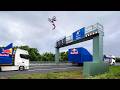 World First Motorbike Flip Between Two Moving Trucks