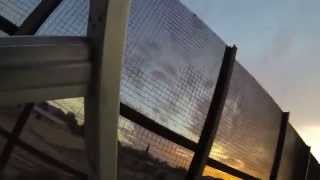 preview picture of video 'American Escape over U.S. Border Wall - Shiny Light on Mexican side of the Fence, 15 Feb, GOPR8941'