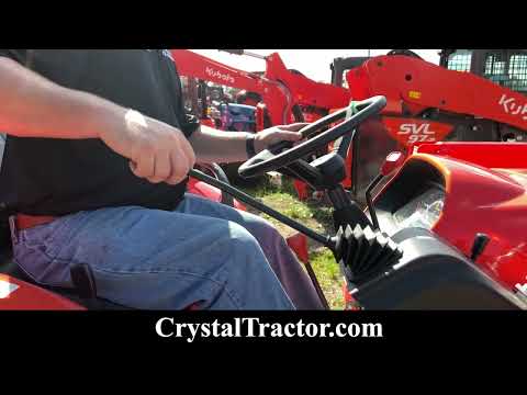 Part of a video titled How to Attach a Bale Spear to your Tractor - YouTube