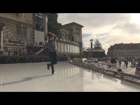Stéphane Lambiel skates among the buildings