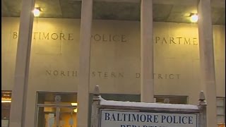 Baltimore gang sends gunman into police station, suspect says