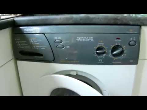 Part of a video titled How to...Move a washing machine with polish and string - YouTube