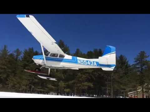Cessna 180 on Skis take off