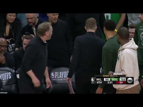 Marcus Smart looks like a cartoon character as he goes down taking the offensive foul from Giannis