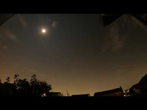Overnight time lapse with rolling clouds and shooting stars