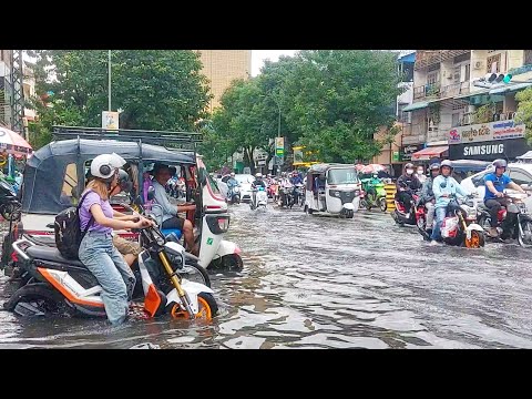 Heavy Rain in Phnom Penh city, Cambodia, Flash Flood with Rain - Walking in the Rain with Umbrella