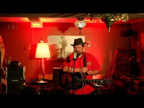 Roland Heinrich:  Drei in einer Reihe - Live im Neruda Kulturcafe, Augsburg