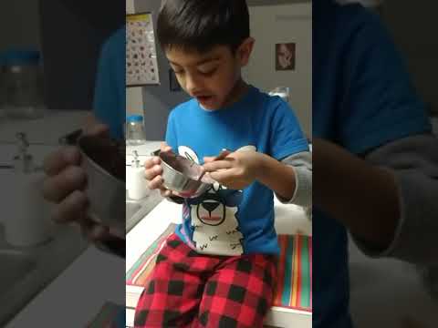 Amay Eating blueberry ice cream