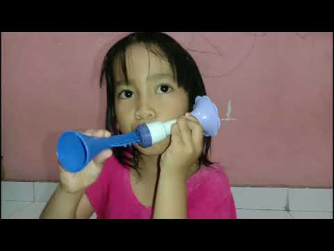 Tutorial cara bermain terompet ala Kakak Habibah...