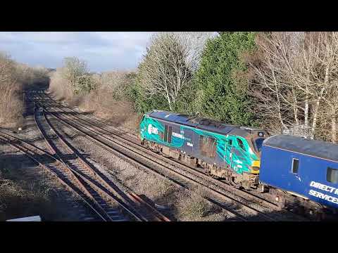 68016 tnt 68006 with a Nuclear Flask and Escort Vehicles at Hatton on 20 January 2023.