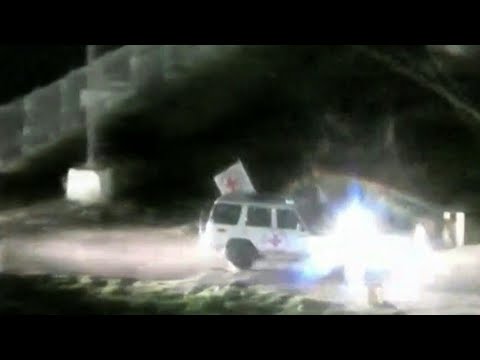 CCTV footage of a convoy transporting released hostages crossing into Israel | AFP