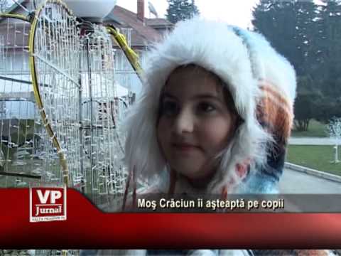 Moş Crăciun îi aşteaptă pe copii