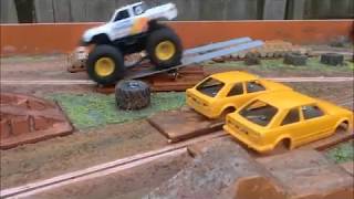 Scale Model Slot Monster Trucks Racing and Freestyle on Scratch Built Scalextric Track.