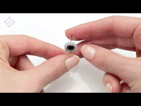 A3244 - Sapphire 7 x 5mm And Diamond 9K Gold Ring