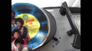 Playing a Cereal Box Cardboard Record