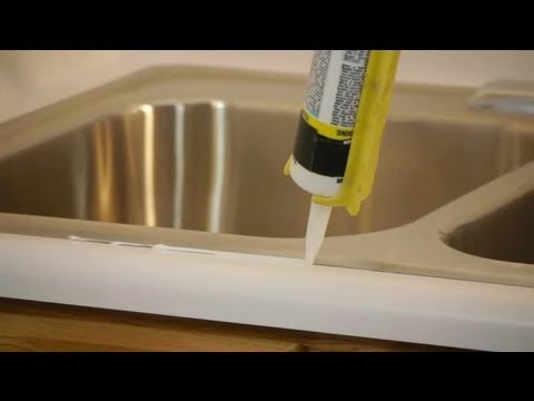 How to caulk & seal a kitchen sink on a laminate countertop:...