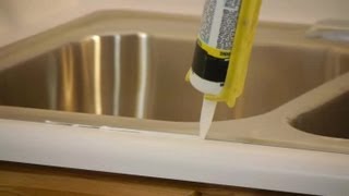How to Caulk & Seal a Kitchen Sink on a Laminate Countertop : Caulking Tips