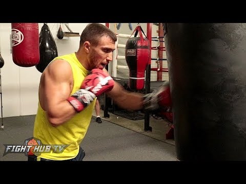 VASYL LOMACHENKO RIPS THE HEAVY BAG WITH CRISP ACCURATE SHOTS