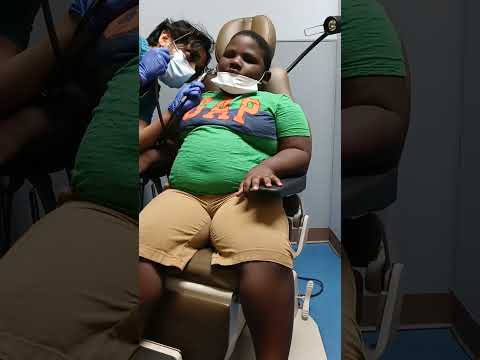 son son getting them ears clean out