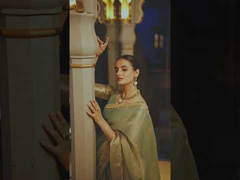 Gold Elegant Tissue Shimmer Saree with Zari Weaving and Sequins Lace Border