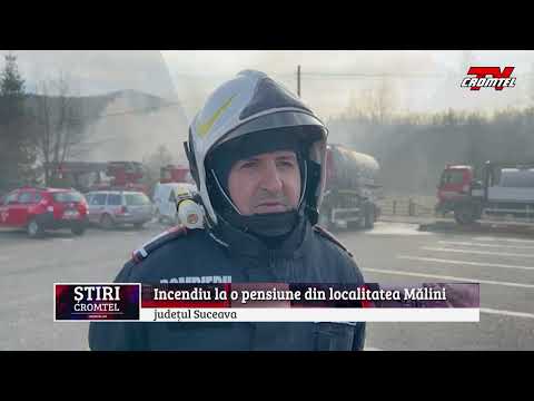 O pensiune turistică din localitatea Mălini, a fost cuprinsă de flăcări