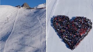 La solidarietà per le vittime della tragedia di Crans Montana in una coreografia sulla neve: cent...