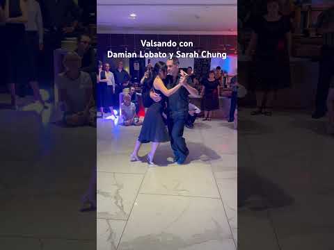  Damian Lobato  and  Sarah Chung  are  dancing  to  the  vals  "  Noche De Estrellas  "  by  Francisco Canaro  in  2006