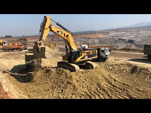 Caterpillar 385C Excavator Loading Mercedes And MAN Trucks - Labrianidis Mining Works