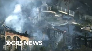 California firefighters work to contain "Coastal Fire" in Laguna Niguel that has destroyed 20 hom…
