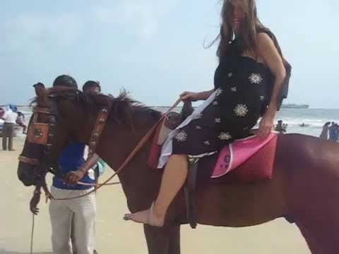 Kierstin riding Horse on Beach in New Mangalore, India