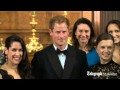 Prince Harry jokes about sitting with two men at.