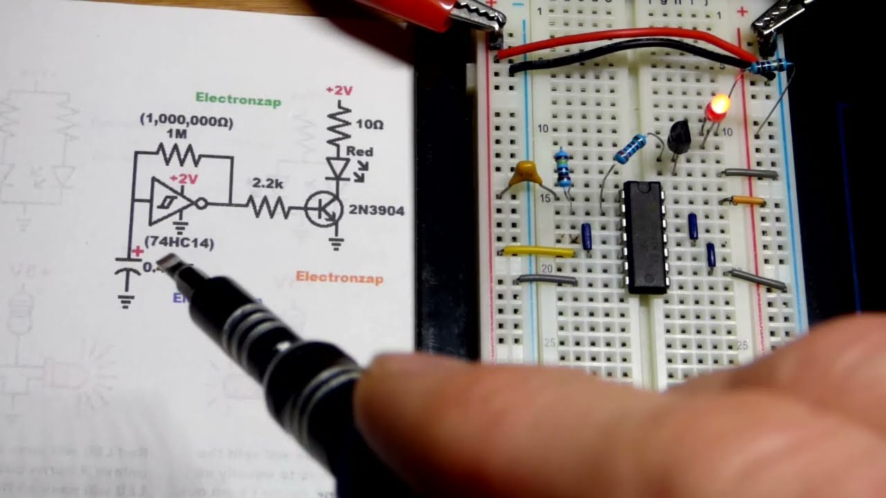 2 Volts 74HC14 Astable Schmitt Trigger NOT Gate Switching NPN BJT LED Load Circuit