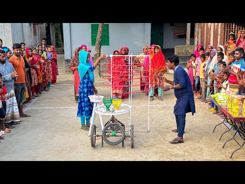 বল গড়ানোর নতুন খেলা দেখতে ভিড় করলো গ্রামের সবাই। প্রয়োজনীয় উপহার জিতে প্রতিযোগিরা মেতে উঠলো আনন্দে