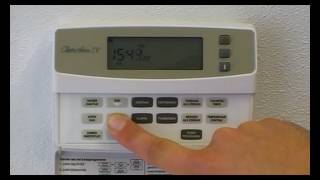 Instellen dag & tijd Chronotherm IV | Honeywell Home