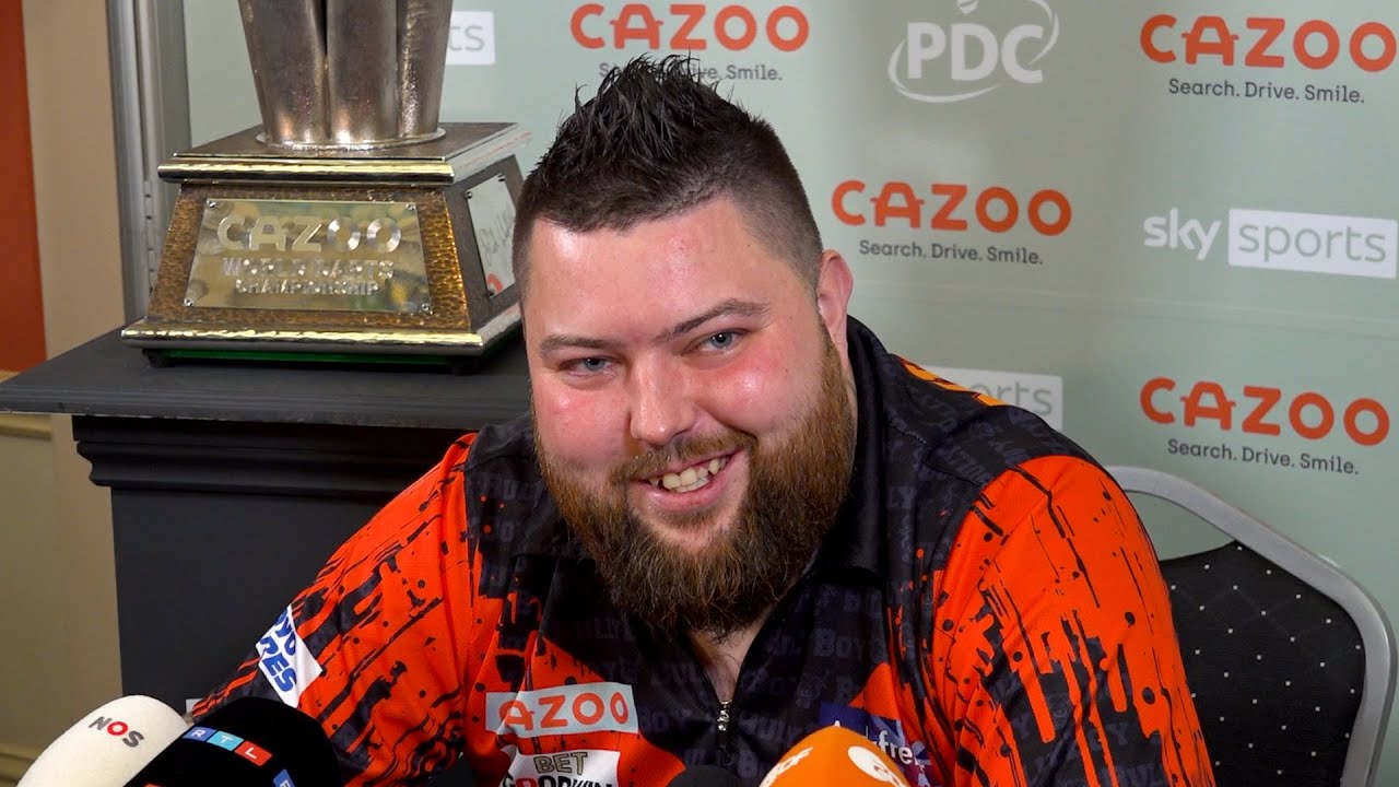 Michael Smith throws nine-darter en route to winning maiden World Championship
