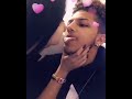 Kissing his girl friend and she bite his tongue