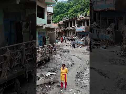 Nepalis try to salvage their ruined homes after flood