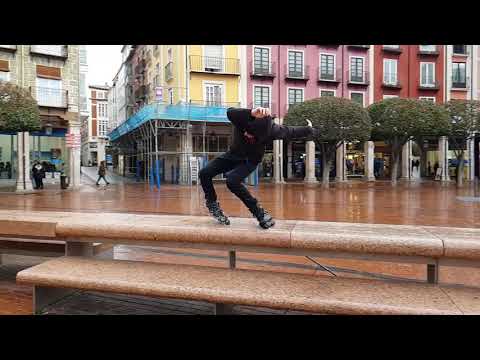 Nick Lomax long cess slide in the rain.