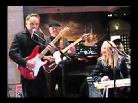 Jimmie Vaughan and Redd Volkaert playing together at the Bob Bullock Museum