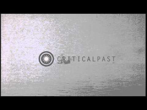 Japanese ships and sampan explodes after being hit from USS Sea Owl underway in t...HD Stock Footage