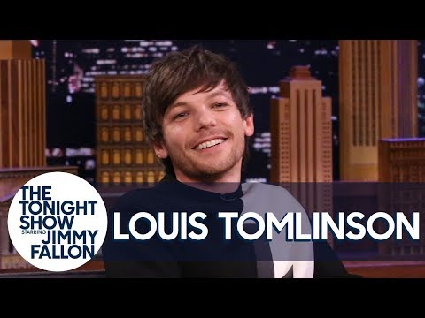Louis Tomlinson Reacts to Home Footage of Himself Starring as Danny Zuko in Grease