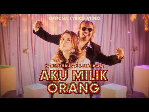 Harry & Beby Acha - Aku Milik Orang (Official Lyrics Video)