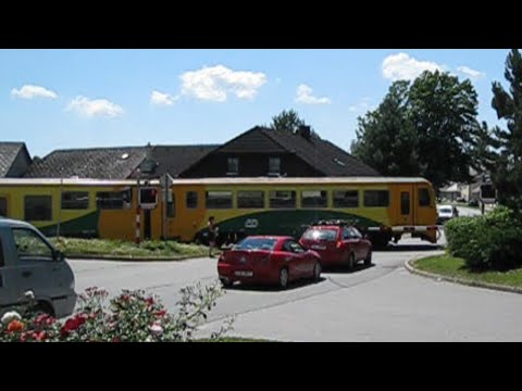Czech Republic: Czech Railways Class 814 'Regionova' multiple unit passes Volary level crossing