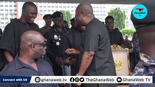 John Mahama and his son given rousing cheers as they file past Atsu's casket