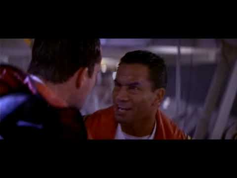 Official teaser still for Speed 2 showing the cruise ship at night with fire erupting along the hull