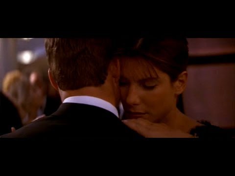 Teaser montage with Sandra Bullock on deck, Jason Patric in pursuit, and party lights over the ship’s pool stage