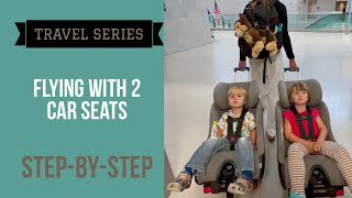 How we fly with 2 car seats