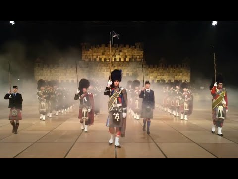 Wow! So many bagpipes and drums marching out of the Scottish Castle