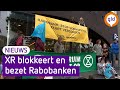 Demonstranten Extinction Rebellion vastgeketend in Rabobank in Elst